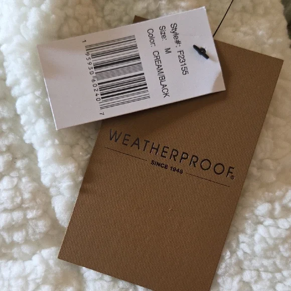 Weatherproof White and Black Sherpa Vest - Picture 2 of 13